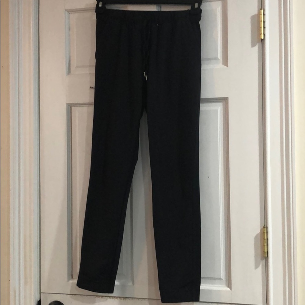 Lululemon black joggers, with slit back pockets